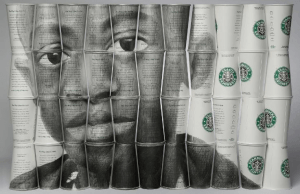 Artwork on Starbucks coffee cups depicting a young boy.